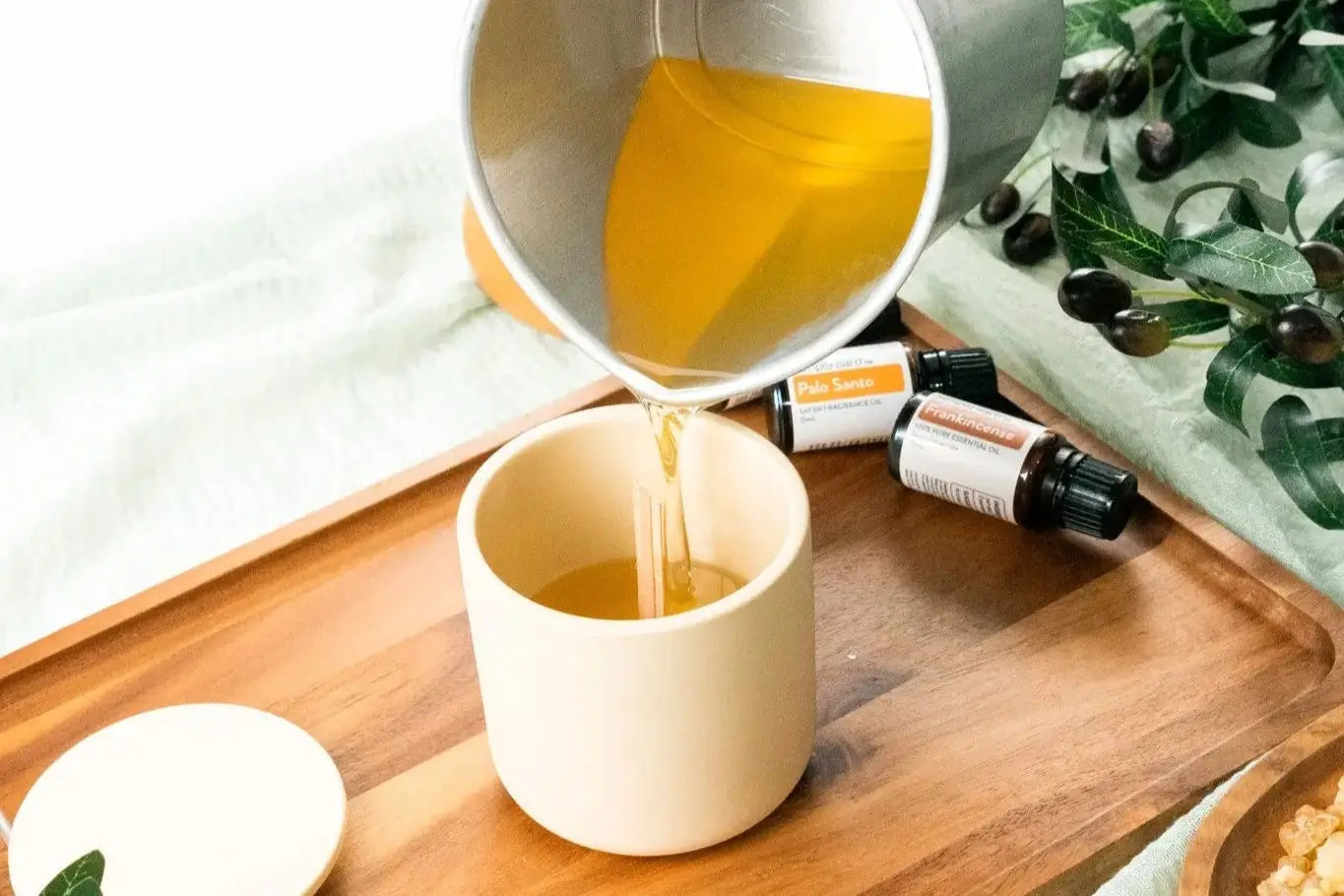 Hand-poured soy candle being made at a workshop
