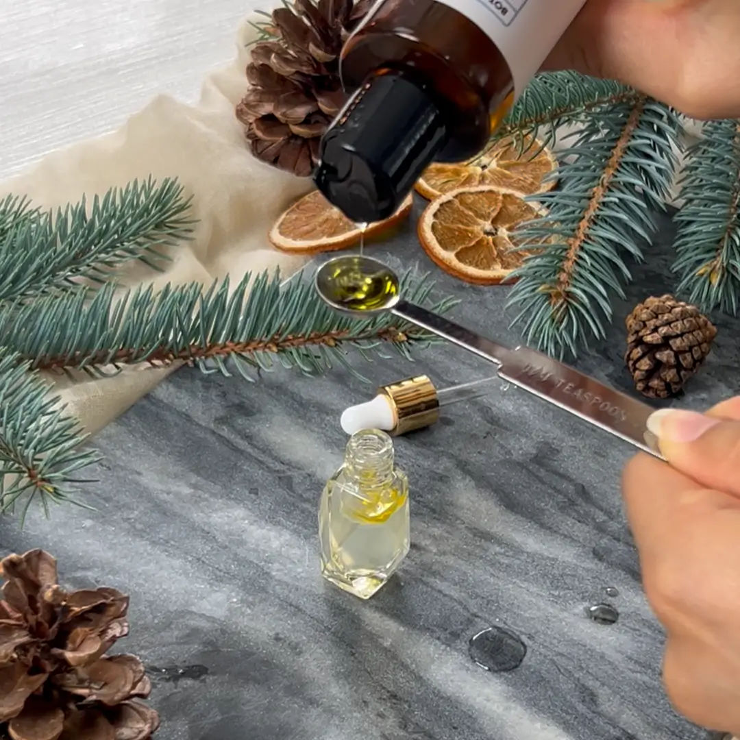 Bumps & Boo-Boos skin serum dropped into its glass serum bottle