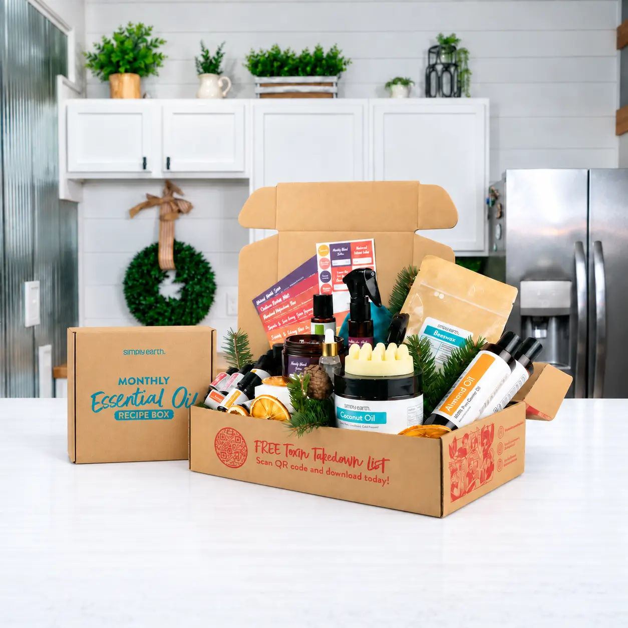 The October Recipe Box opened on a kitchen counter, with its oils, supplies and finished recipes