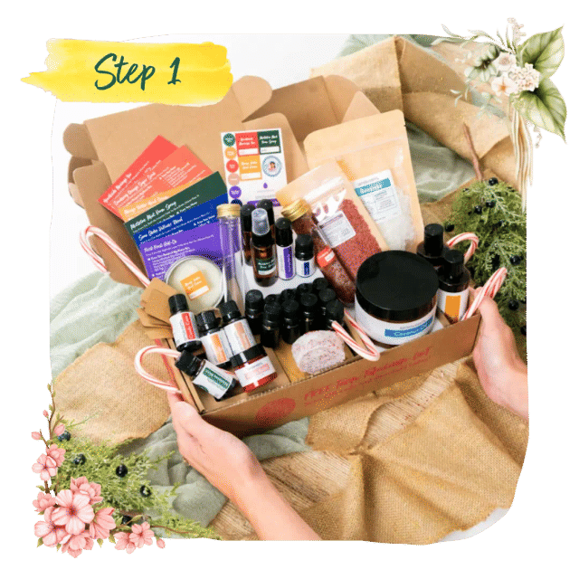 Step 1 &mdash; hands holding an open Recipe Box packed with oil bottles, recipe cards, a pouch of cranberry seeds and candy canes